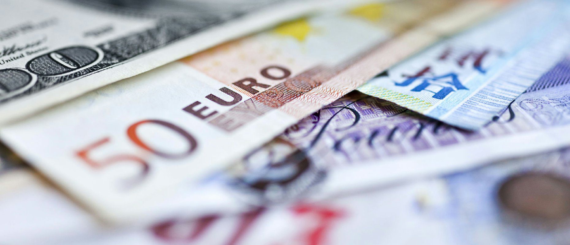 Mudanças cambiais durante viagens corporativas: o que fazer?